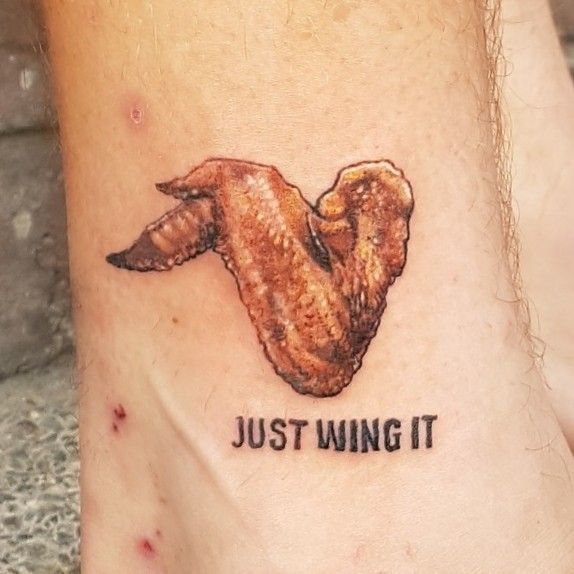 Some Dude Got a Tattoo of a KFC Double Down  E Online