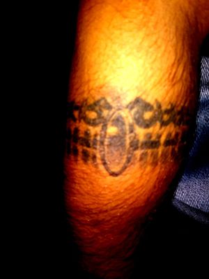 Tribal arm band on my right forearm..