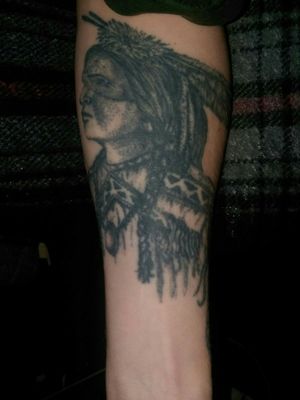 The guy that did this name is David Mathias.Tattos is a Native American warrior.