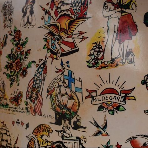 The designs on this flash sheet show what an international clientele Tattoo Ole has had over the years.
