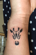 Giraffe symbol on the wrist #tinytattoos #giraffetattoo #smalltattoos 