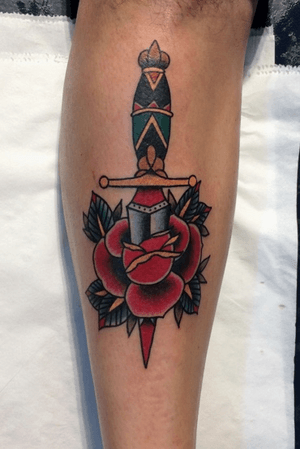 Dagger and rose, classic traditional tattoo. Done by me Nico Viegas