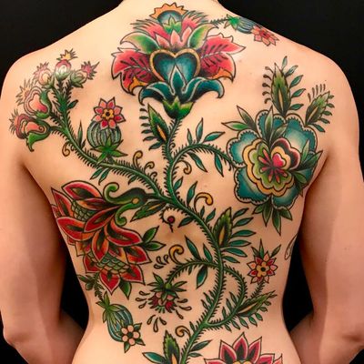 Tattoo by Virginia Elwood #VirginiaElwood #flowertattoos #flowers #floral #backpiece #coverup #folktraditional #leaves #nature #color