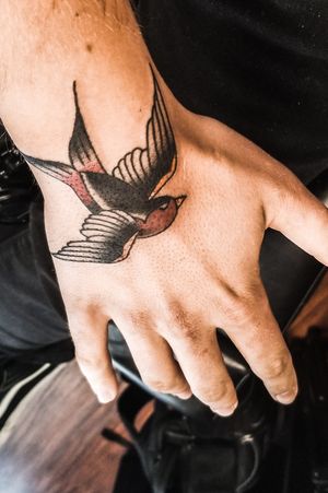 Anerican traditional sparrow American traditional bird Hand tattoo