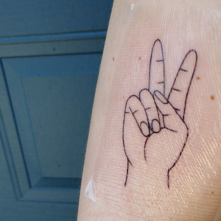 50 Peace Sign Tattoos