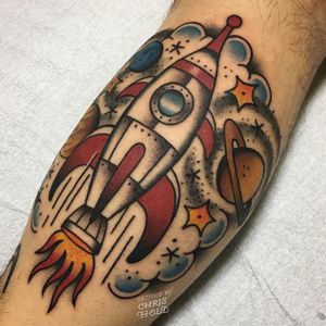 Tattoo by Chris Hold #ChrisHold #spacetattoos #color #traditional #spaceship #outerspace #moon #stars #planets #galaxy #space #fire #saturn #dots #travel