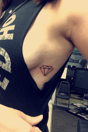 My newest tat! Just a simple outline of a diamond on my side 