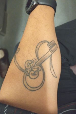 Matching lock and key tattoo. I have the key and wifey has the lock in the shape of a heart. 