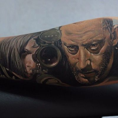 Tattoo by Sergey Shanko #SergeyShanko #leontheprofessionaltattoos #LeonTheProfessional #movietattoos #film #leon #Mathilda #gun #realism #realistic #portrait