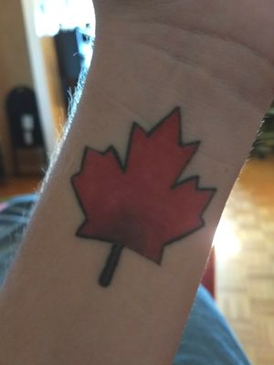 Canadian leaf which has both the real leaf colours and the red of the flag 