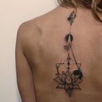 Geometrical dotwork lotus tattoo 
