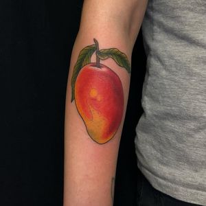 Tattoo by Patrick Macdonald #PatrickMacdonald #fruittattoo #color #watercolor #traditional #mashup #realistic #mango #fruit #leaves #food #nature