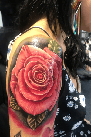 Realistic rose shoulder tattoo