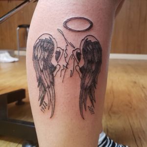 Lost but not forgotten. With love. In memory. Angel wings. Black and gray.