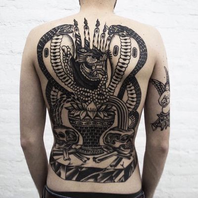 Tattoo by xgusakx #xgusakx #snaketattoo #blackwork #cobra #panther #vase #lotus #skull #skeleton #bones #snake #reptile #backpiece #backtattoo #hand #candles #surreal