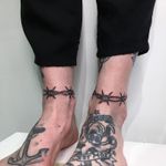 Tattoo by Nina Chwelos #NinaChwelos #illustrative #linework #fineline #barbedwire #ankle