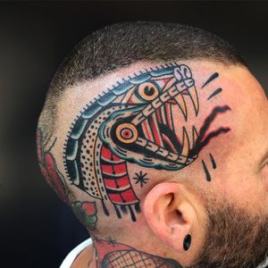 Tattoo by Almagro Tattooer #AlmagroTattooer #snaketattoo #traditional #snake #reptile #animal #severedhead #skulltattoo #star
