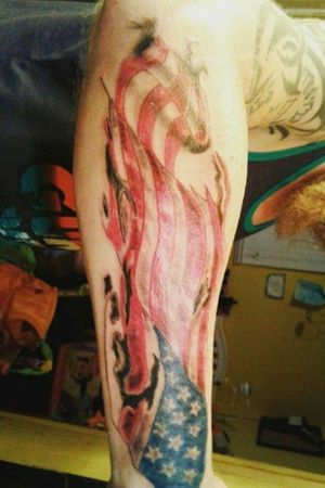 "Traditional American Flag through battle" #realism #tattooartist #tattooamerica #tattooart 