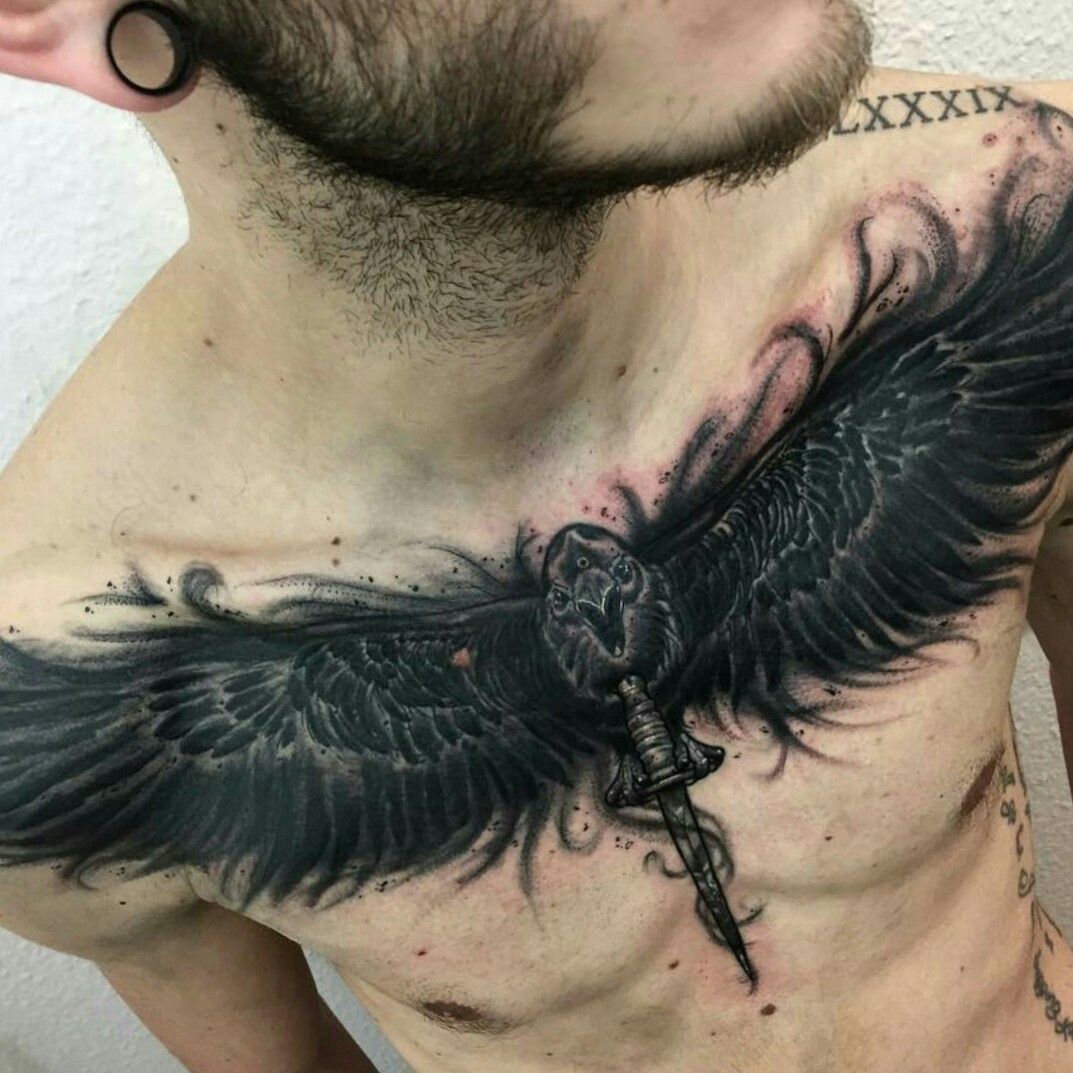 Black Ink Two Ravens With Skull Tattoo On Man Chest