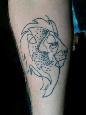 Lion tattoo, forearm.