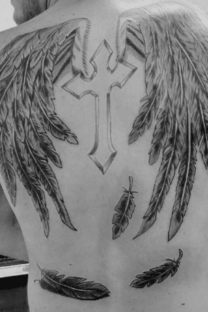 Ive always wanted wings and i had finally gotten them after completing military training; someones guardian angel.