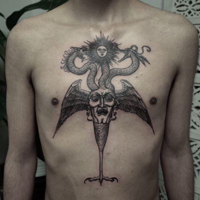 Tattoo by Odd Tattoo #OddTattoo #monstertattoo #monster #blackandgrey #illustrative #linework #darkart #medieval #strange #surreal #creature #wings #feathers #portrait #snakes #dragon #sun