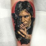 Han Solo tattoo by Alex Rattray #AlexRattray #realism #realistic #hyperrealism #portrait #popculture #HarrisonFord #StarWars #HanSolo #movietattoo #scifi #gun
