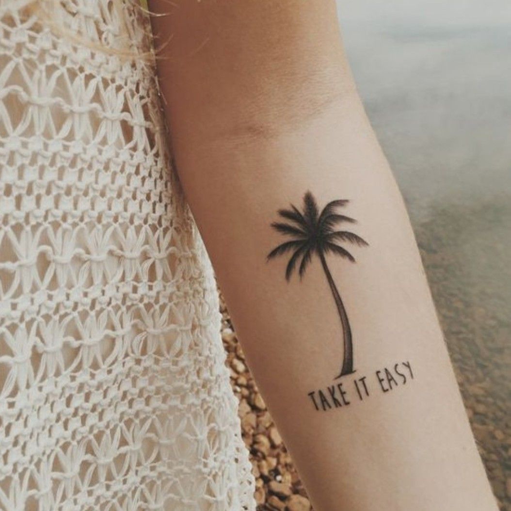 Palm tree tattoo on the inner forearm