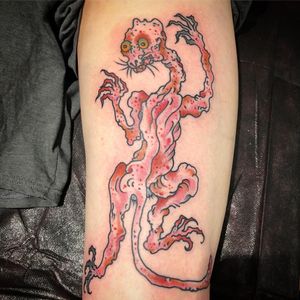 Tattoo by Chad Koeplinger #chadkoeplinger #monstertattoo #color #traditional #darkart #panther #junglecat #skinned #zombie #strange #surreal #creature