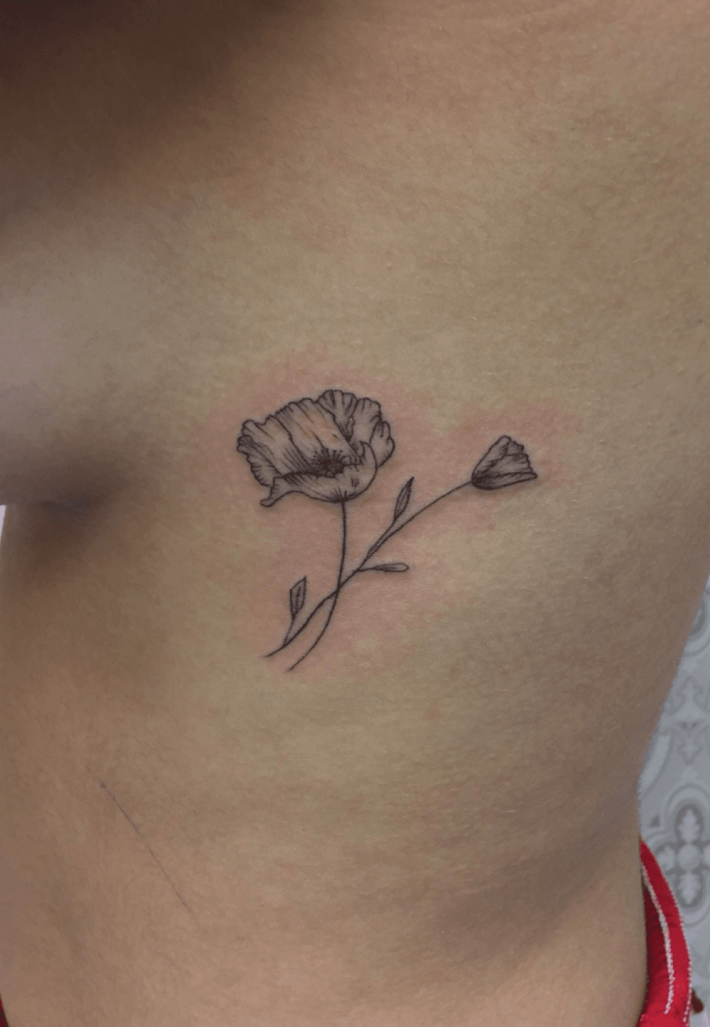 Poppy and rose tattoo by Tattooist Flower  Beautiful flower tattoos  Watercolor tattoo flower Flower tattoo designs