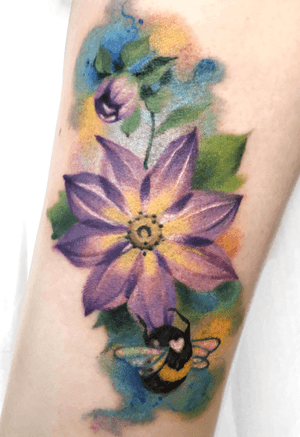 Watercolor floral ornament on the ankle 