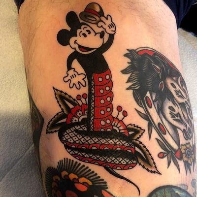 Tattoo by Ryan Cooper Thompson #RyanCooperThompson #MickeyMousetattoo #MickeyMouse #Disney #mouse #animal #cartoon #surreal #strange #mashup #snake #flowers #floral #hat #color #traditional