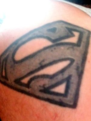 My first tattoo. Almost died back in 04 in a carwreck. Friends called me "Superman" for surviving.. Got the symbol but in cracked stone to help remind me that even as invincible as we feel the strongest of us can even break