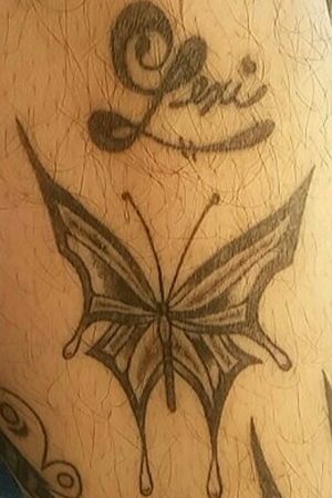 Prison work. Drawn by one of my daughters done on my leg.