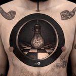 Tattoo by Jamie Luna #JamieLuna #surrealtattoo #blackandgrey #surreal #strange #lightbuld #checkerboard #opticalillusion #idea #creative #blackink