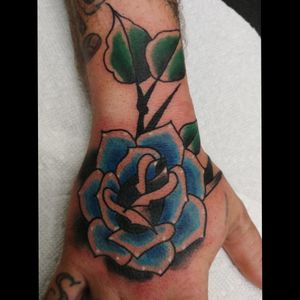 Rose tattoo by Travis Crow