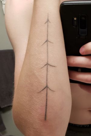 Simple, subtle Tree Arm Tattoo by Matt Scanlan of Think Tank Denver CO