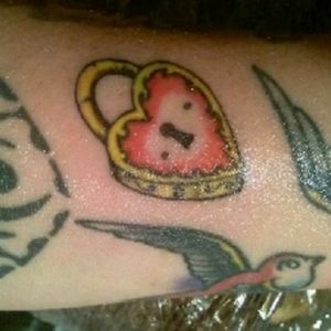 Heart locket tattoo