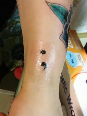 Semicolon tattoo.   Sorry about the glare 😀