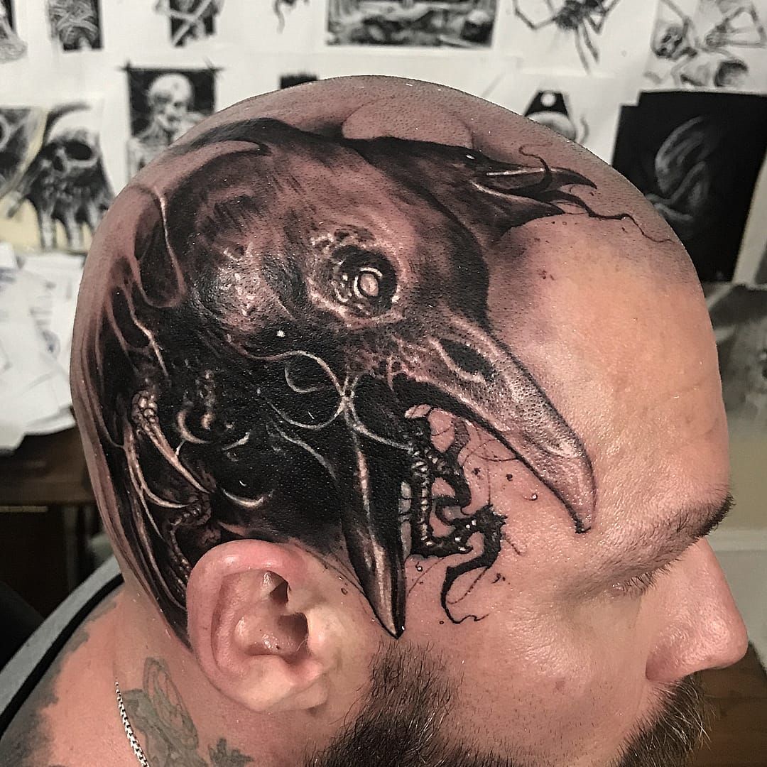 tribal raven head tattoo