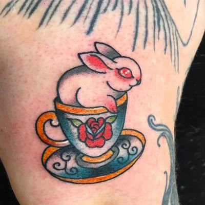 Tattoo by Dawn Cooke aka prettytoughttattoos #DawnCooke #prettytoughttattoos #besttattoos #color #traditional #bunny #rabbit #teacup #cute #pink #tea #flower #rose #floral