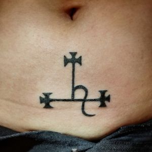 The symbol of Lilith on the client's lower abdomen.