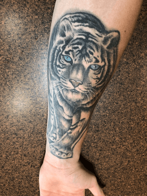 Tiger forearm tattoo 