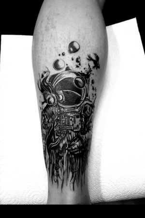 Space scuba diver tattoo