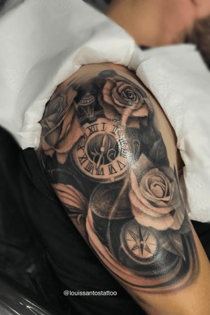 Black and grey clock and roses