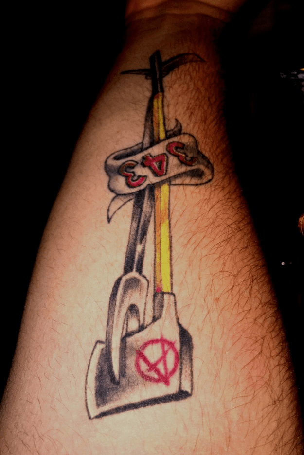 crossed fire axes tattoo
