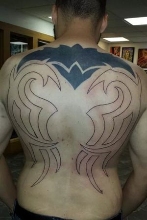 Partially finished back piece.Tribal representation of a phoenix.Done by AJ McMillen