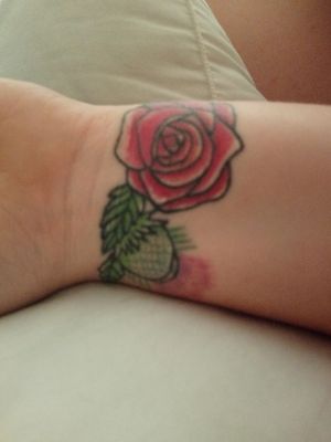 A rose and thistle to symbolise my Scottish partner and me being english