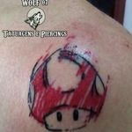 Cogumelo Vermelho do Jogo Mario Bros. de Nintendo Instagram do Cliente: @ferrazjrr Instagram e Tattoodo do Tatuador: @wolf07_ Instagram e Tattoodo do Estúdio: @wolf07tatuagens #cogumelo #cogumelovermelho #mario #mariobros #supermariobros #supermarioworld #marioworld #mushroom #redmushroom #ink #tatuagem #bodyart #tattoo #tintanapele #eletricink #nintendo #supernintendo