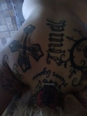 Down middle of my back are two names different up and down.....  Janell and Jamie...  Awesomness 